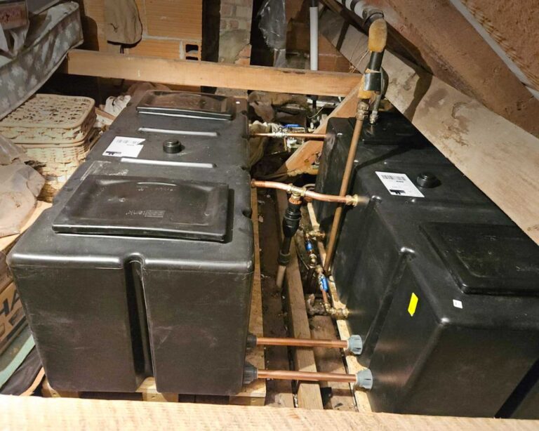 Cold water storage tank in loft fitted by Sally's Pipe Dream