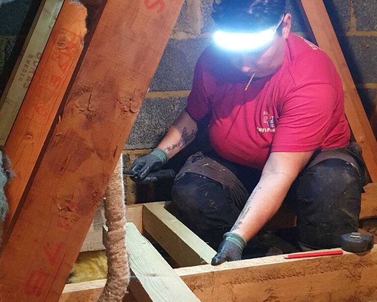 Sally King working in loft space