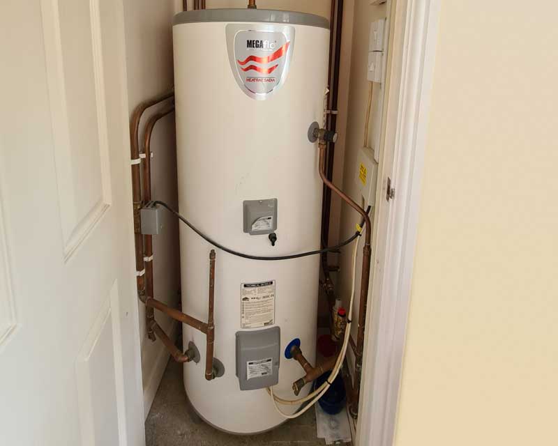 Replace pipework on unvented cylinder allowing correct configuration