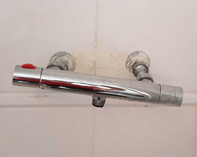 Replace broken and crooked shower valve with new shower valve fitted correctly